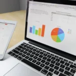 Laptop and tablet showing data charts for a backup plan