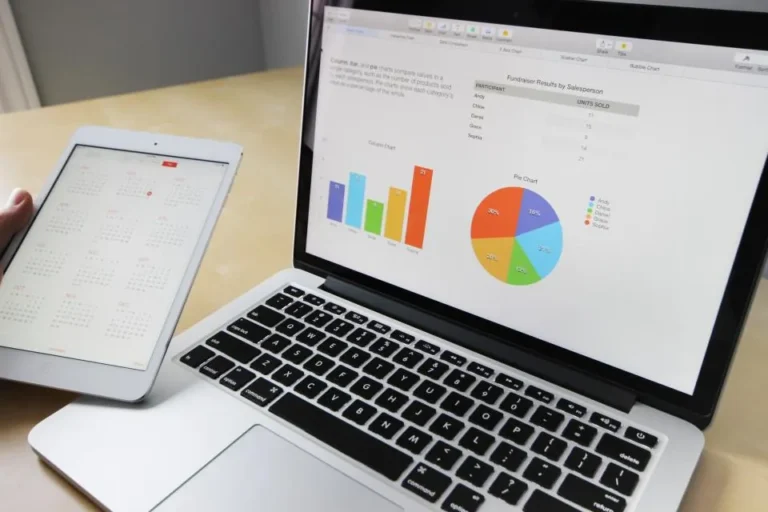 Laptop and tablet showing data charts for a backup plan