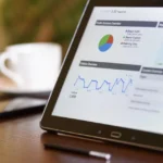 Tablet dashboard showing customer retention analytics